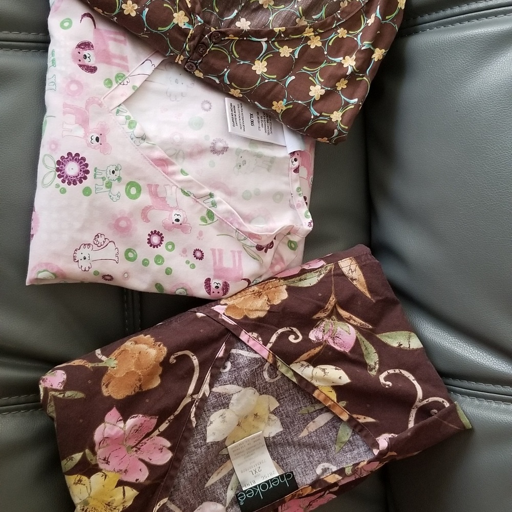 Cute scrub tops slightly used